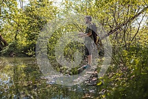 Recreational fisherman at river bank