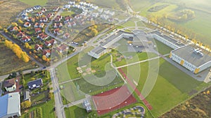 Recreational green grass active sports hockey and football fields overhead top down view. Competition court active outdoor people