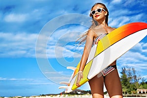 Recreational Summer Water Sports. Surfing. Girl Holding Surfboard