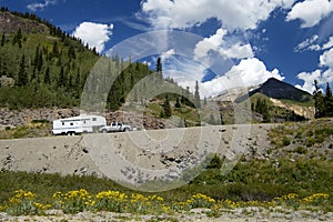 Recreational vehicle in the mountains photo