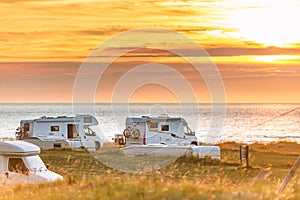 Recreational vehicle at sunset Norway, Europe photo