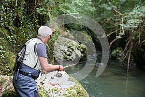 Recreative fishing of trouts photo