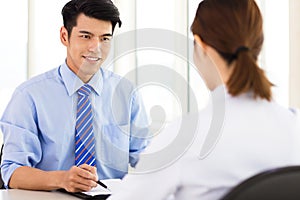 Recruiter checking the candidate during job interview photo