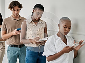 Recruitment, office and business people waiting for an interview or hr meeting while writing notes and networking