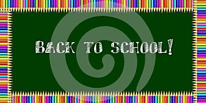 Rectangle frame made of colorful pencils on green blackboard background with back to school chalky inscription inside.