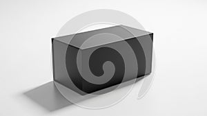 Rectangular black box with a matte finish on a white surface