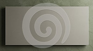 Rectangular canvas with a plain, light gray surface, positioned against a textured