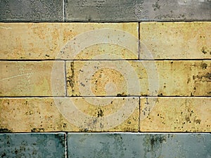 Rectangular glazed tile background with rust effect