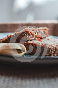 Rectangular greenish souffle on plate photo