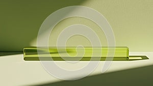 A rectangular prism-shaped object with a green tint sits on a light green surface.