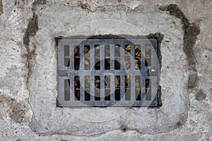 Rectangular sewer with a rust and holes