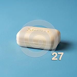 Rectangular shape with rounded edges. Below the soap the number 27 is