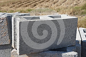 Rectangular thick concrete blocks .