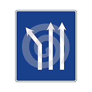Rectangular traffic signal in blue and white, isolated on white background. Fork to the left on a three-lane road