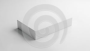 White box with a minimalistic design placed on a smooth white