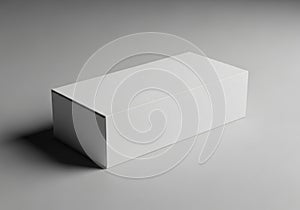 Rectangular white cardboard box on a plain, light-gray surface. The