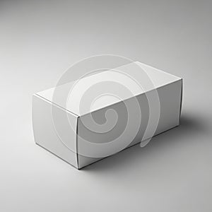 Rectangular white cardboard box with smooth surfaces and sharp edges placed on a