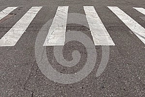 Rectangular white parallel crossings used in cities for pedestrian crossings