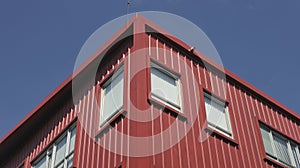 Rectangular window on red building facade