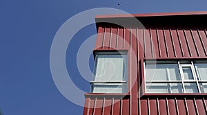 Rectangular window on red building facade