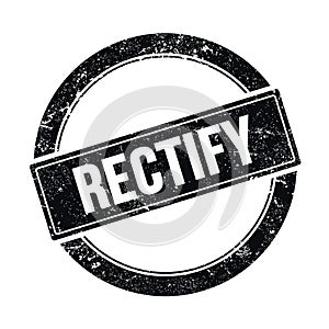 RECTIFY text on black grungy round stamp