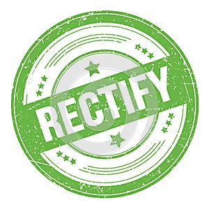 RECTIFY text on green round grungy stamp photo