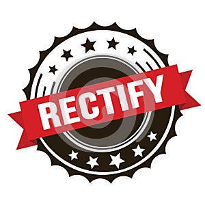 RECTIFY text on red brown ribbon stamp