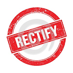 RECTIFY text on red grungy round stamp photo