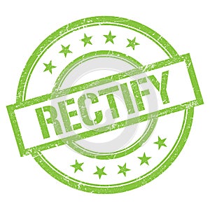 RECTIFY text written on green vintage stamp photo