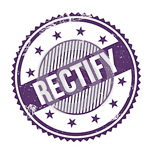 RECTIFY text written on purple indigo grungy round stamp