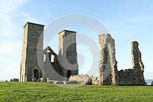 Reculver towers a roman saxon shore fort and remains of a 12th century church undercut by coastal erosion.