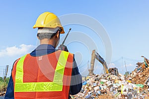 Recyclable waste, Workers sort out waste for recycling photo