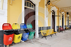 Recycle bin. Container of recyclable waste available in public square for use by the local population. Environmental awareness