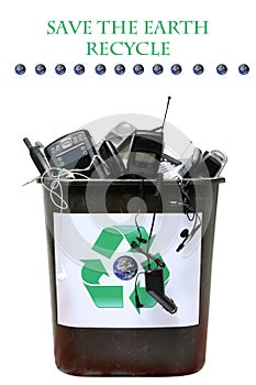 recycle bin filled with old cell phones