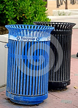 Recycle bin and garbage can at beach