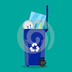 Recycle bin for garbage full of glass things.