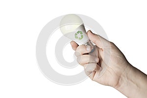 Recycle concept: man hold a light bulb with recycle symbol on white background