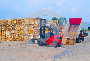 Recycle industry cardboard garbage and paper waste after pressing in hydraulic baling garbage press machine to a square dense for