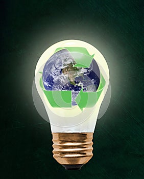 Recycle Planet Earth Inside Light Bulb With Copy Space