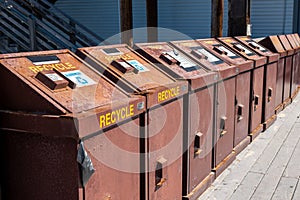 Recycle and trash bins containers for in a row