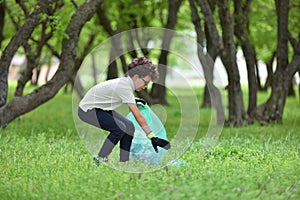 Recycle waste litter rubbish garbage trash junk clean training. Nature cleaning, volunteer ecology green concept. Young men and