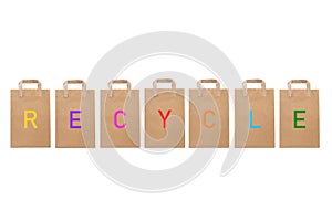 Recycle word write in different paper bags photo