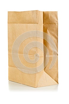 Recycled brown paper bag over white background