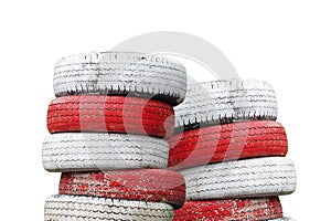 Recycled Car tires painted red and white Is a traffic symbol no parking.which isolated on a white background