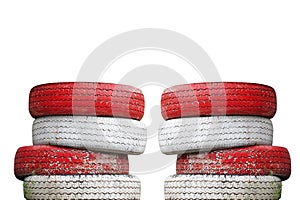 Recycled Car tires painted red and white Is a traffic symbol no parking.which isolated on a white background