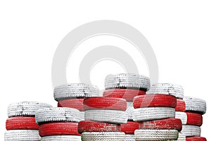 Recycled Car tires painted red and white Is a traffic symbol no parking.which isolated on a white background