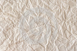 Recycled crumpled beige paper texture background