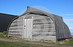 Recycled old boat hull in use as storage hut