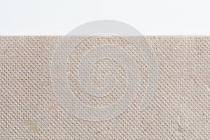 Recycled paper background with white strip, close-up texture with copy-space