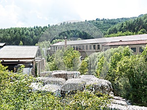 Recycled paper factory. Bales of cardboard, boxes and papers prepared to be recycled in a warehouse